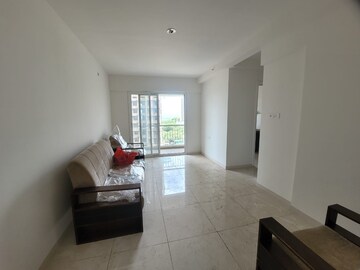 Living Room in 2 BHK Apartment at Godrej Emerald, Ghodbunder Road – for Sale