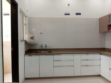 Kitchen in 3 BHK Apartment at KM Residency, Raj Nagar Extension – for Sale