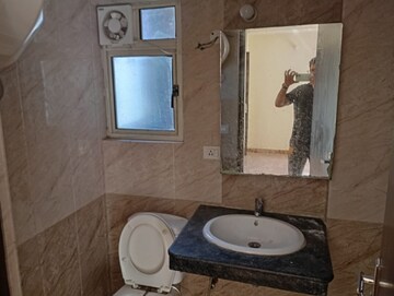 Bathroom in 2 BHK Apartment at Sam Palm Olympia, Sector 16c Greater Noida – for Sale