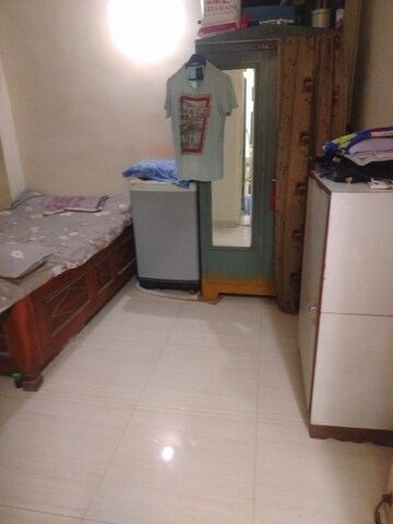 Living Room in 2 BHK Apartment at Parvati CHS Andheri, Andheri East – for Sale