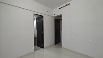 Room in 1 BHK Apartment at Kolte Patil Vaayu, Dahisar West – for Sale