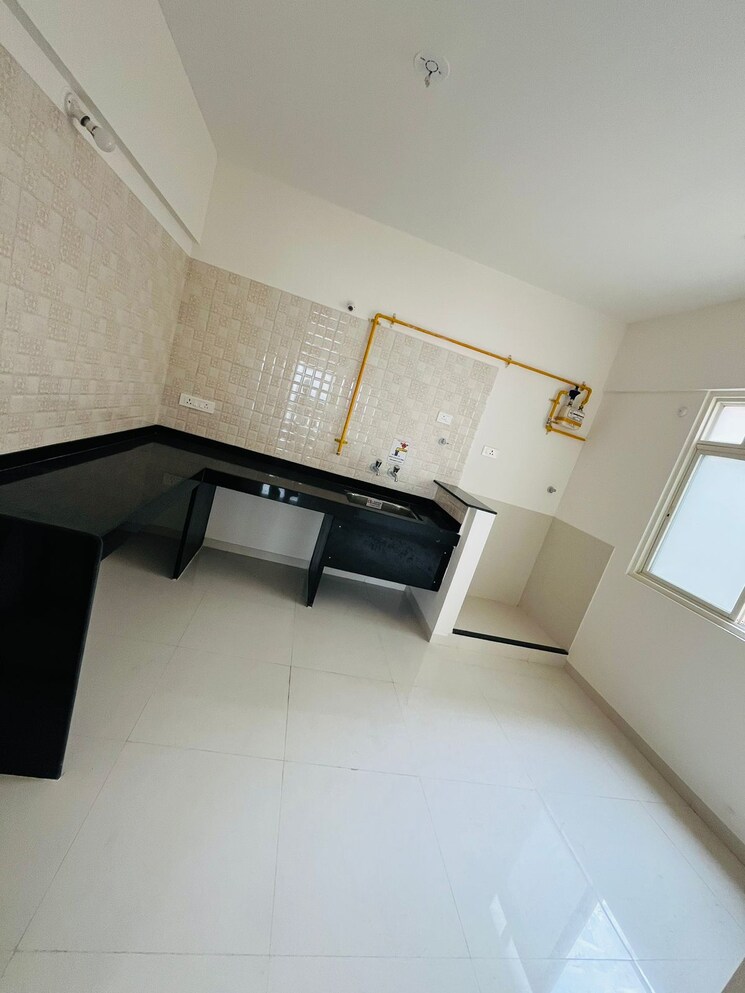 Kitchen, nyati-elan 3 Bedroom 1450 Sq.Ft. Apartment In Wagholi Pune 7450183