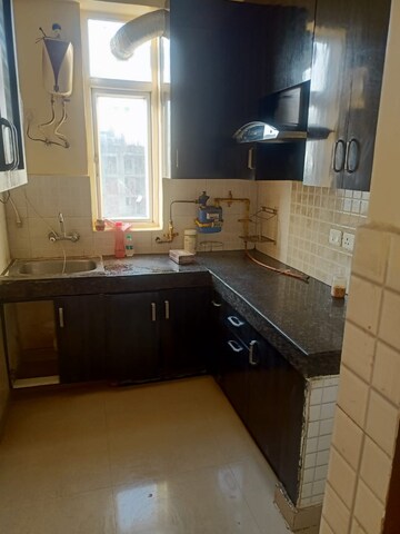 Kitchen in 2 BHK Apartment at Zeta I Greater Noida – for Sale