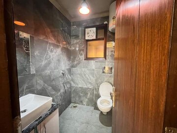 Bathroom in 2 BHK Builder Floor at Chattarpur – for Sale