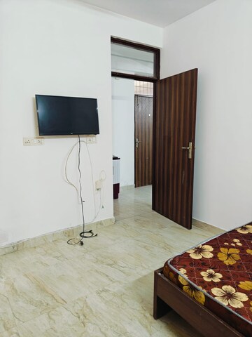Bedroom in 1.5 BHK Builder Floor at Chattarpur – for Sale