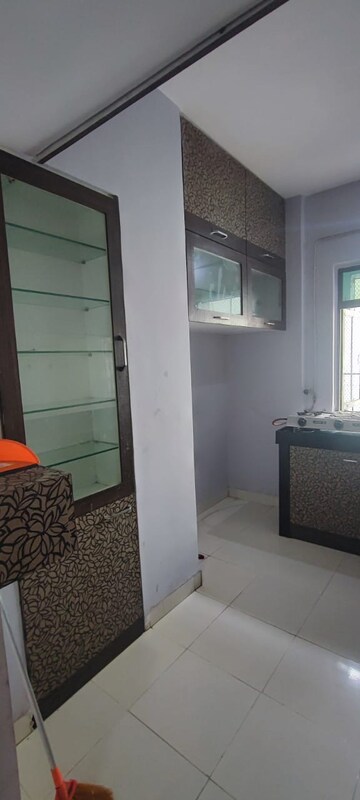 Kitchen in 1 BHK Apartment at New Brahmand Phase 7 CHS, Brahmand – for Sale