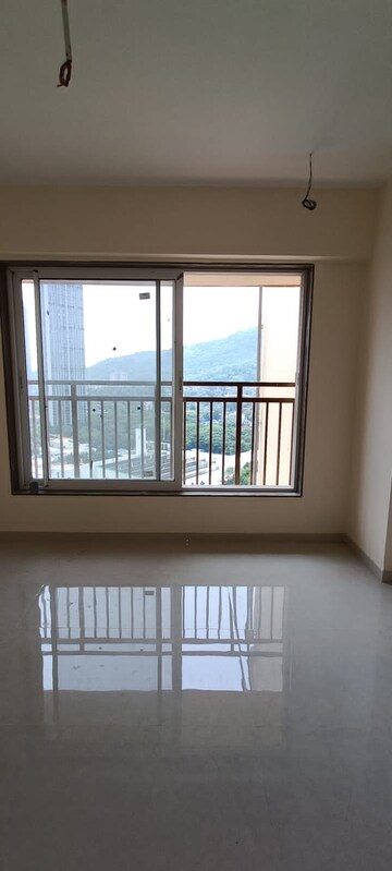 Room in 2 BHK Apartment at Mulund West – for Sale