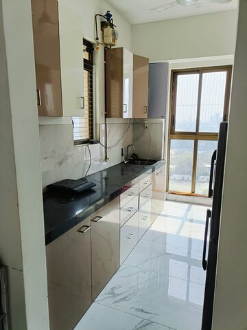 Kitchen in 2 BHK Apartment at Bhimjyani Verraton, Manpada – for Sale