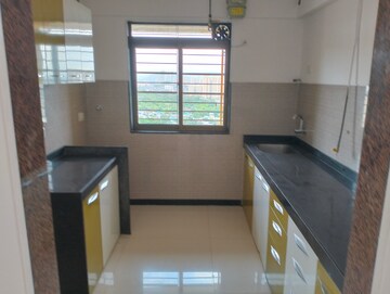 Kitchen in 3 BHK Apartment at Acme Ozone, Manpada – for Sale