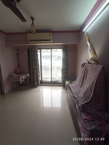 Living Room in 1 BHK Apartment at Chakala Pragati Chs, Jb Nagar – for Sale