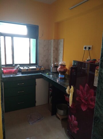 Kitchen in 1 BHK Apartment at RNA NG Regency Phase I, Balkum Pada – for Sale