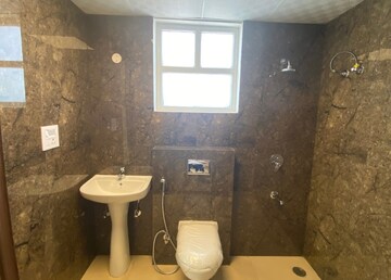 Bathroom in 3 BHK Apartment at Motia Harmony Greens, Kishanpura – for Sale