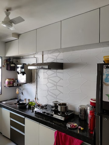Kitchen in 3 BHK Apartment at Om Dronagiri CHS, Borivali East – for Sale