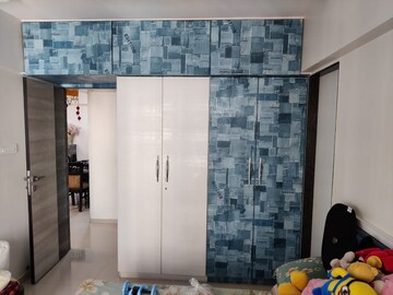 Bedroom in 3 BHK Apartment at Om Dronagiri CHS, Borivali East – for Sale
