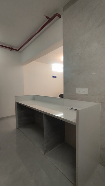 Kitchen in 1 BHK Apartment at Triveni Pearl, Khadakpada – for Sale