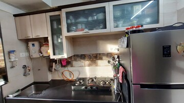 Kitchen in 1 BHK Apartment at Hiranandani Estate Oyster, Ghodbunder Road – for Sale