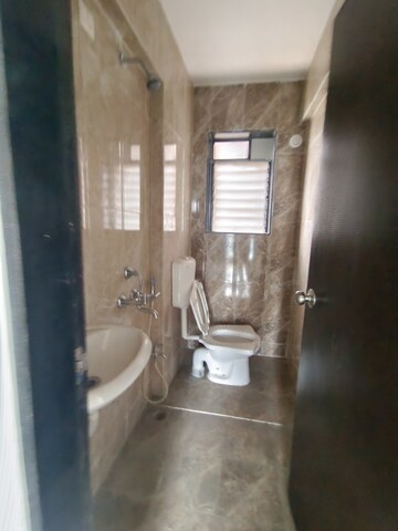 Bathroom in 3 BHK Apartment at Haware Dahlia, Kasarvadavali – for Sale