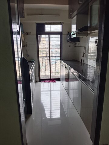 Kitchen in 2 BHK Apartment at RNA N G Silver Spring, Mira Road – for Sale