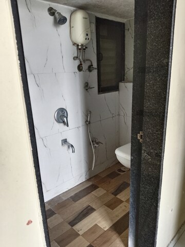 Bathroom in 2 BHK Apartment at RNA N G Silver Spring, Mira Road – for Sale