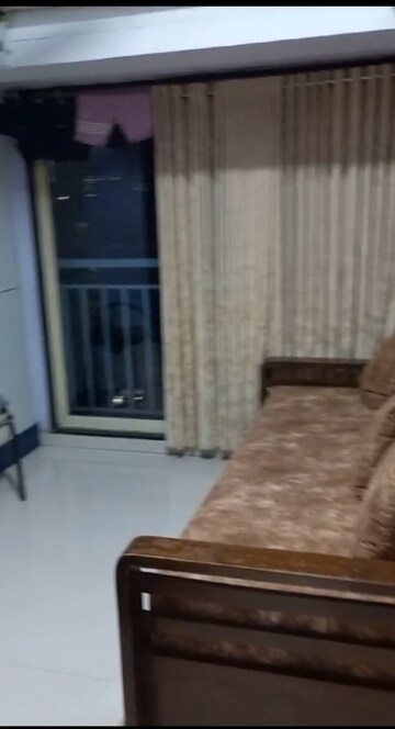 Living Room in 2 BHK Apartment at Tropical Prima CHS, Naupada – for Sale