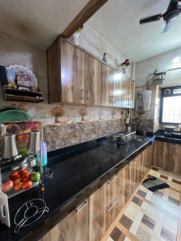 Kitchen in 2 BHK Apartment at Cirrus CHSL Cosmos Paradise, Vasant Vihar – for Sale