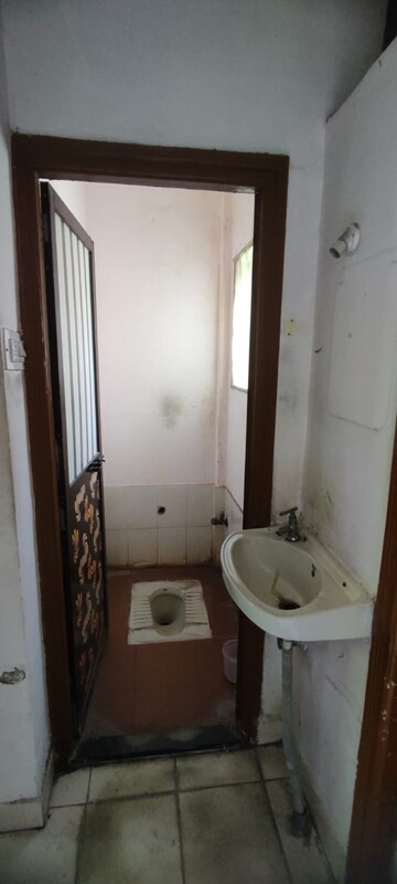 Bathroom in 1 RK Apartment at Swastik Park CHS, Ghodbunder Road – for Sale