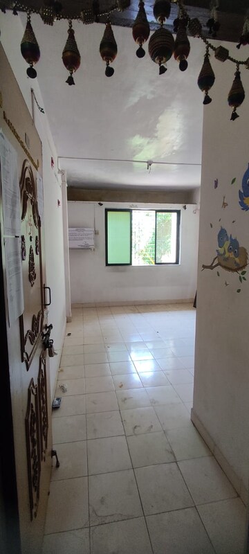 Living Room in 1 RK Apartment at Swastik Park CHS, Ghodbunder Road – for Sale