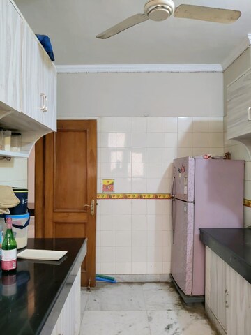 Kitchen in 3 BHK Builder Floor at Ansal Sushant Lok I, Sector 43 – for Sale