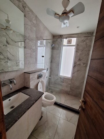 Bathroom in 4 BHK Builder Floor at Ansal API Esencia, Sector 67 – for Sale