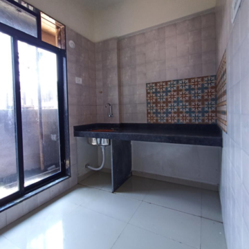 Kitchen in 1 BHK Apartment at Kamothe Matoshri CHS, Sector 5 – for Sale