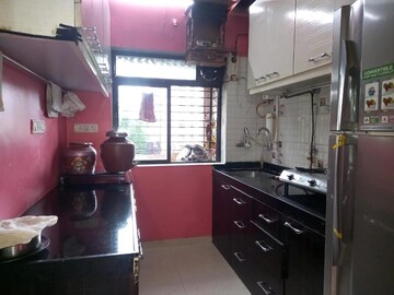 Kitchen in 1 BHK Apartment at DB Parkwoods, Ghodbunder Road – for Sale