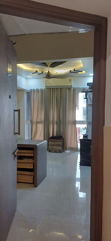 Living Room in 2 BHK Apartment at Lodha Crown Taloja Quality Homes, Dombivli East – for Sale