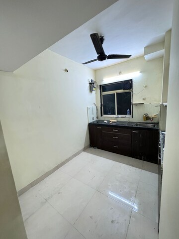 Kitchen in 1 BHK Apartment at DSS Mahavir Kalpavruksha Alcacia Tower, Ghodbunder Road – for Sale