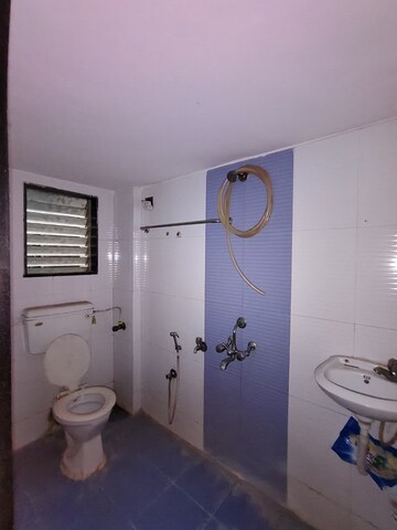 Bathroom in 2 BHK Apartment at Shankheshwar Nagar CHS, Dombivli East – for Sale