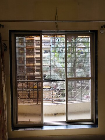 Room in 2 BHK Apartment at Shankheshwar Nagar CHS, Dombivli East – for Sale
