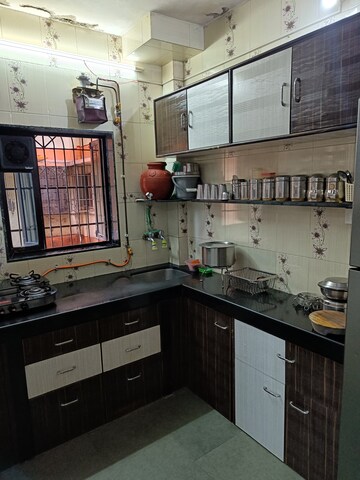 Kitchen in 1 BHK Apartment at Sanghvi Garden, Manpada – for Sale