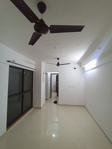 Living Room in 1 BHK Apartment at Lodha Palava Downtown Dombivli East, Dombivli East – for Sale