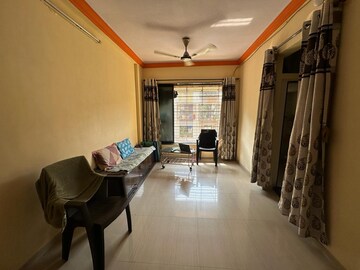 Living Room in 2 BHK Apartment at Shankheshwar Nagar CHS, Dombivli East – for Sale