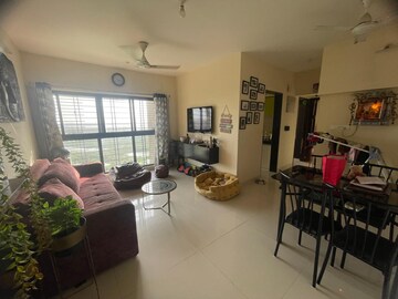Living Room in 2 BHK Apartment at Rustomjee Meridian, Kandivali West – for Sale