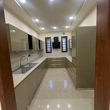 Kitchen in 4 BHK Builder Floor at Puri Aman Vilas, Sector 89 – for Sale