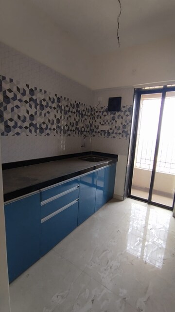Kitchen in 2 BHK Apartment at Raunak City Phase 3, Kalyan West – for Sale