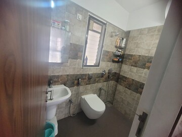 Bathroom in 2 BHK Apartment at Ashray Jaswanti Woods, Mulund West – for Sale