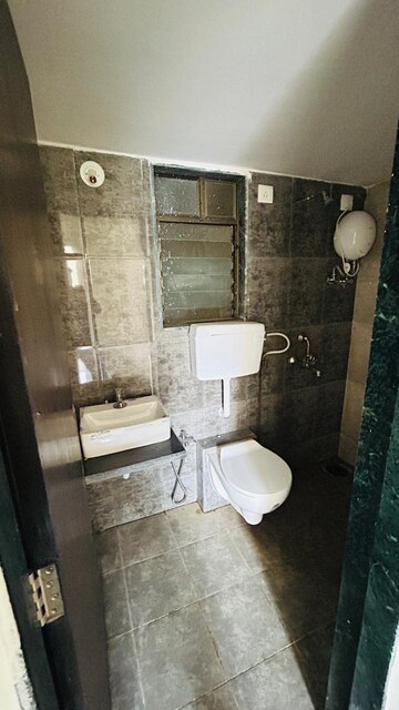 Bathroom in 1 BHK Apartment at Ekta Brooklyn Park, Virar West – for Sale