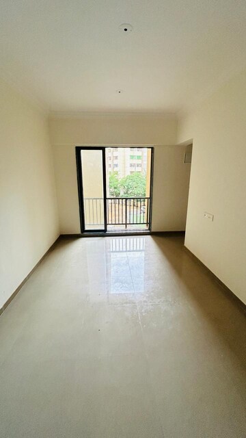 Living Room in 1 BHK Apartment at Ekta Brooklyn Park, Virar West – for Sale