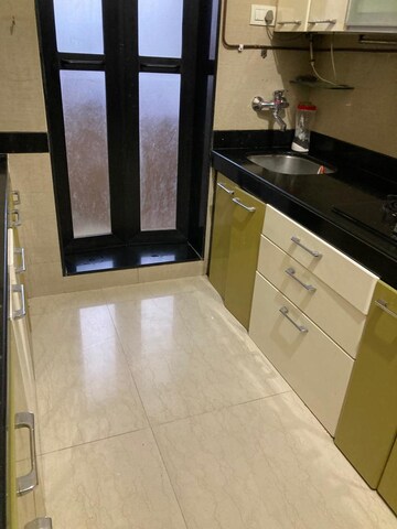 Kitchen in 1 BHK Apartment at K Raheja Raheja Residency, Malad East – for Sale