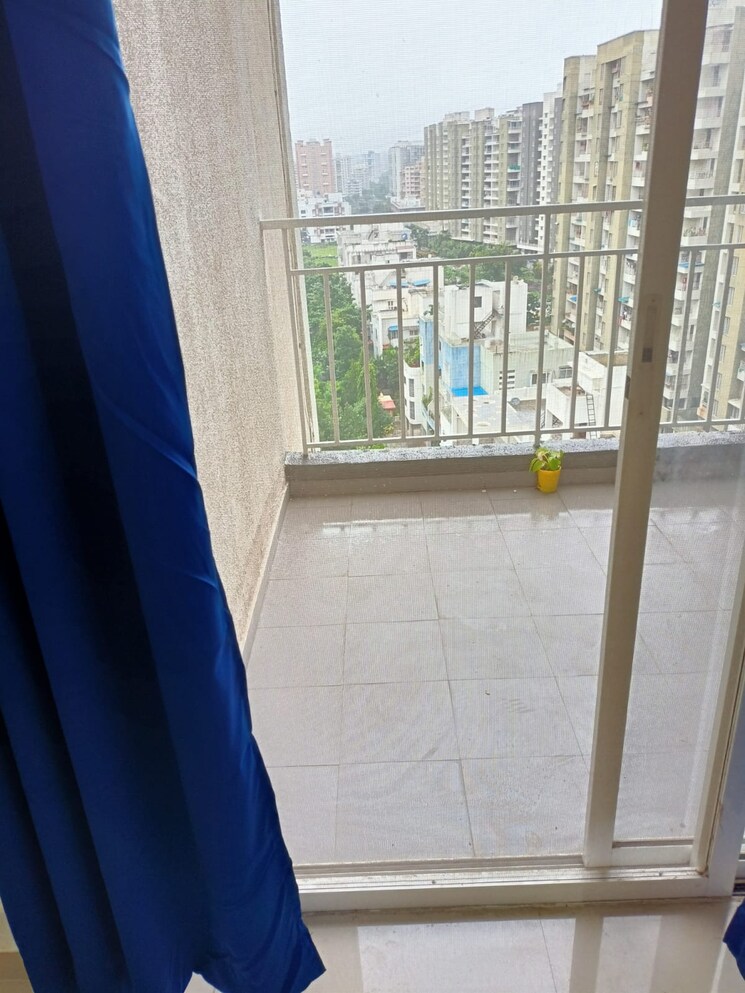 Balcony, godrej-greens 3 Bedroom 900 Sq.Ft. Apartment In Undri Pune 7465114