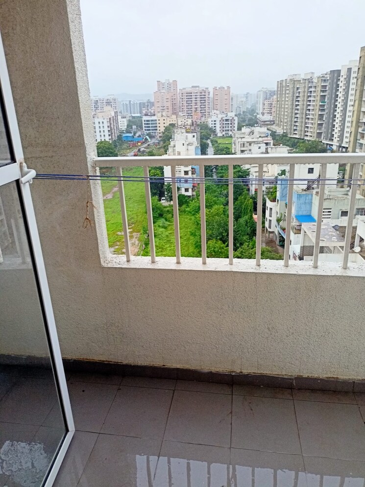 Balcony, godrej-greens 3 Bedroom 900 Sq.Ft. Apartment In Undri Pune 7465114