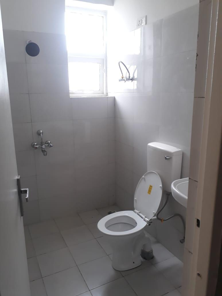 Bathroom in 3 BHK Apartment at Adore Happy Homes Pride, Sector 75 – for Sale