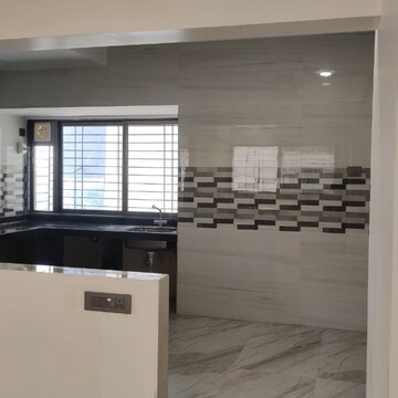 Kitchen in 4 BHK Apartment at Yayati CHS, Seawoods Sector 36 – for Sale