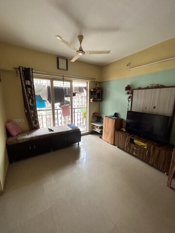 Living Room in 1 BHK Apartment at Rosa Gardenia, Anand Nagar – for Sale